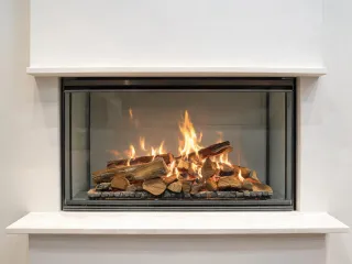 Empire gas fireplace with ceramic logs
